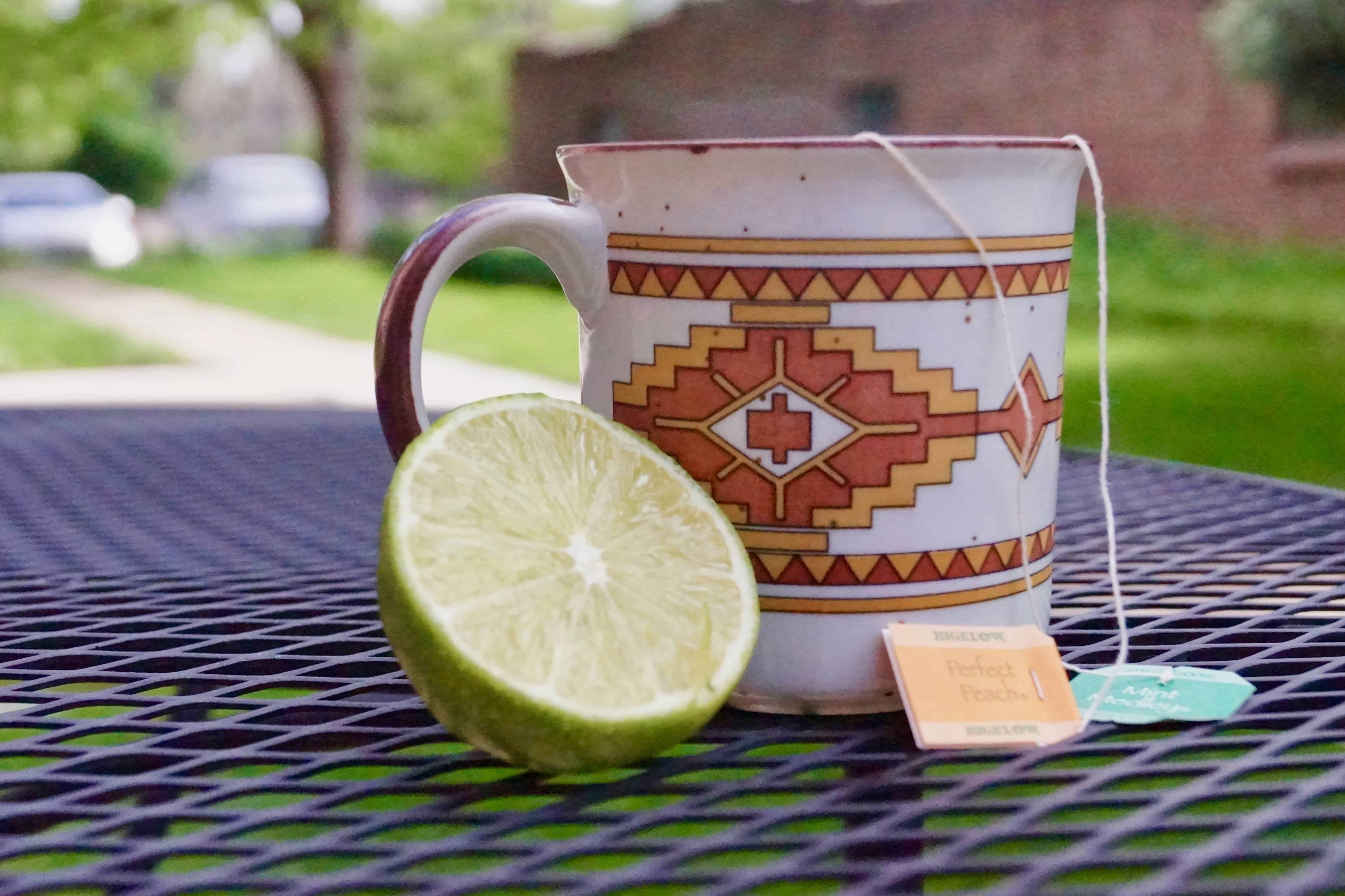 Prepared cup of herbal tea with lime #medicineballtea #herbalteaforcolds 