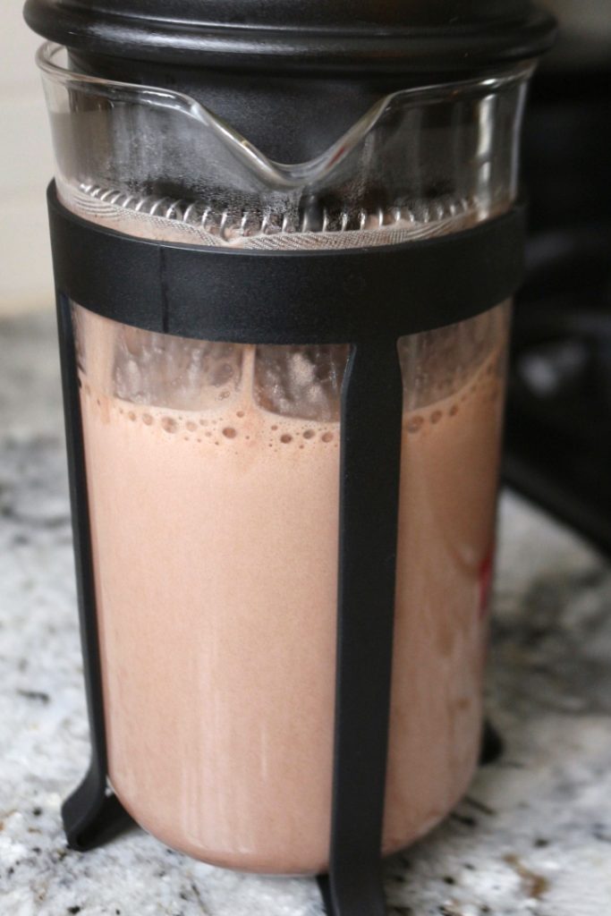 Frothing chocolate milk in a French press