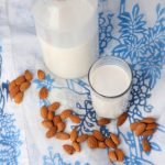 Glass of almond milk and bottle of almond milk #homemadealmondmilk