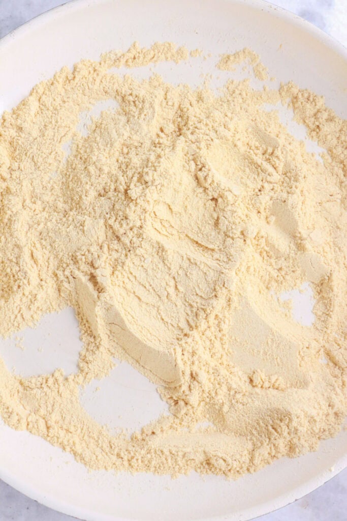 Toast the masa harina in a pan