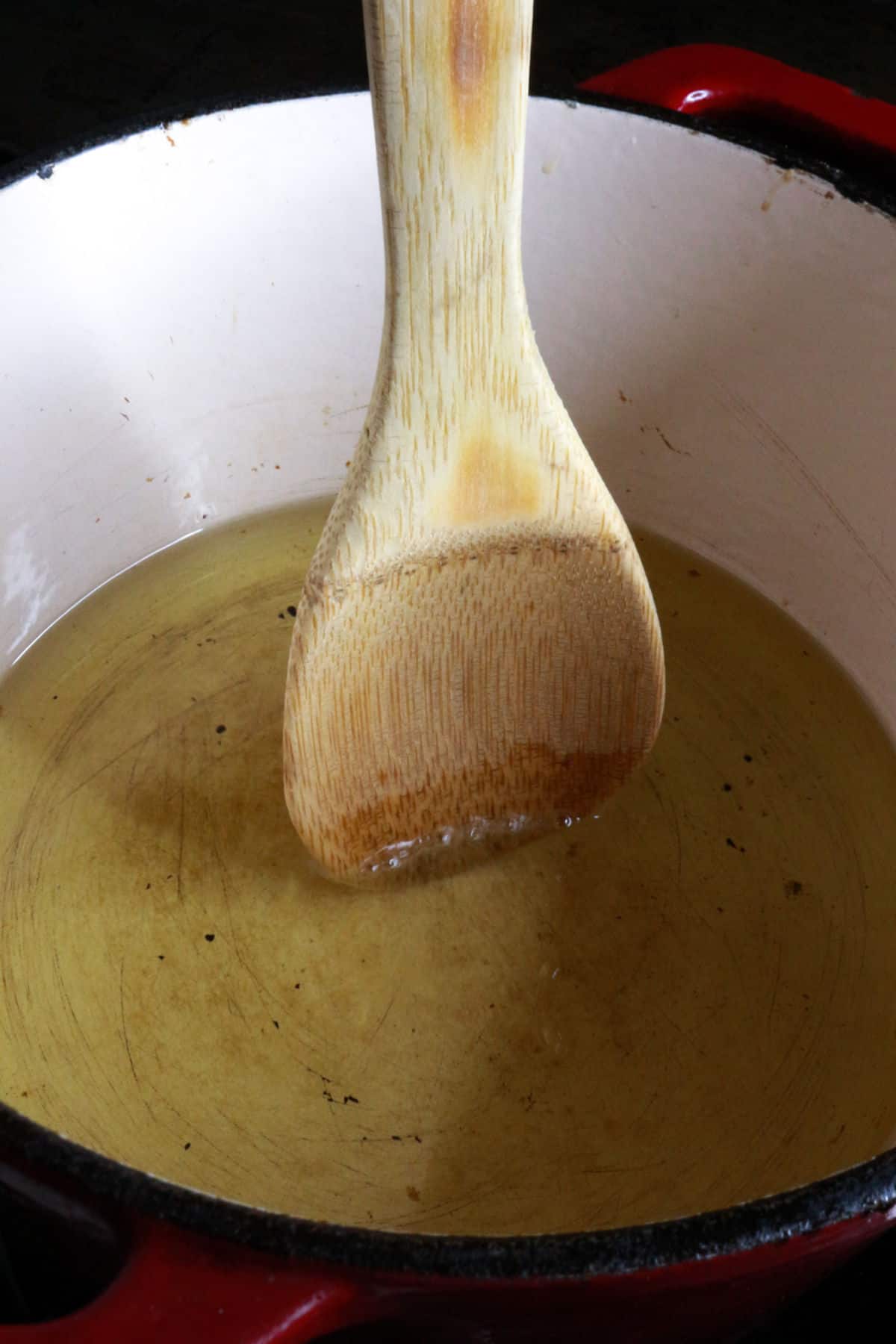 Wooden spoon in oil