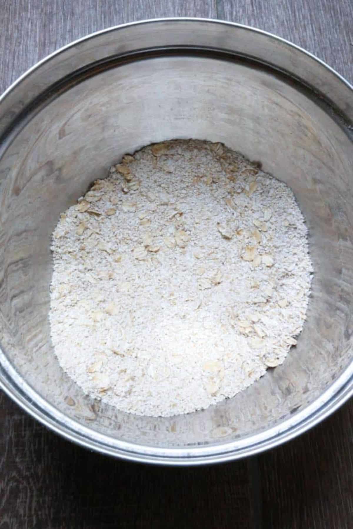 Oat flour in a metal bowl