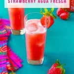 Agua de Fresa in glasses garnished with fresh strawberries