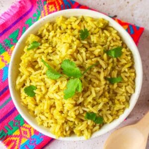 Top view of Arroz Verde Poblano garnished with cilantro