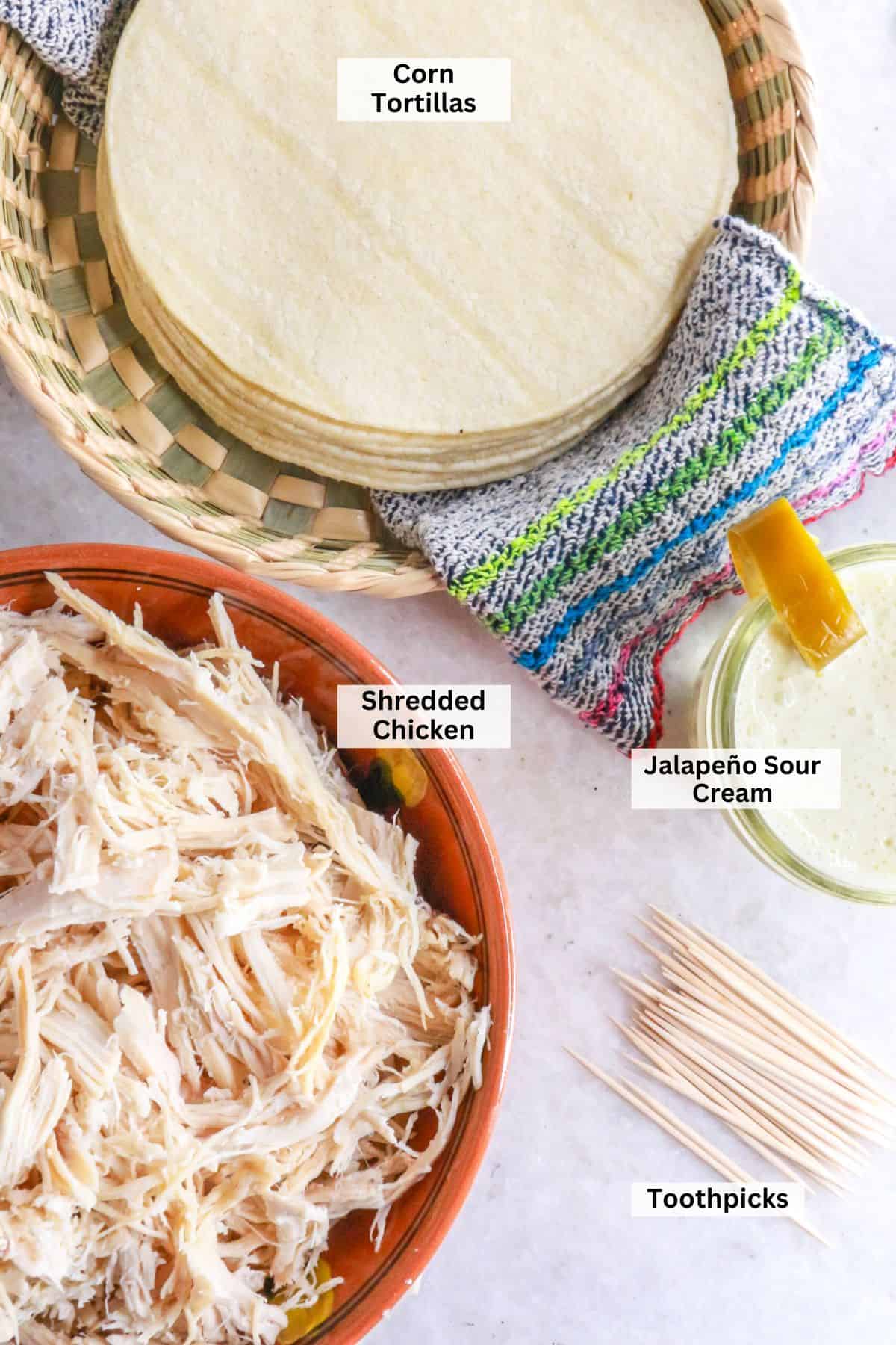Ingredients for flautas de pollo: corn tortillas, jalapeño sour cream, shredded chicken, toothpicks