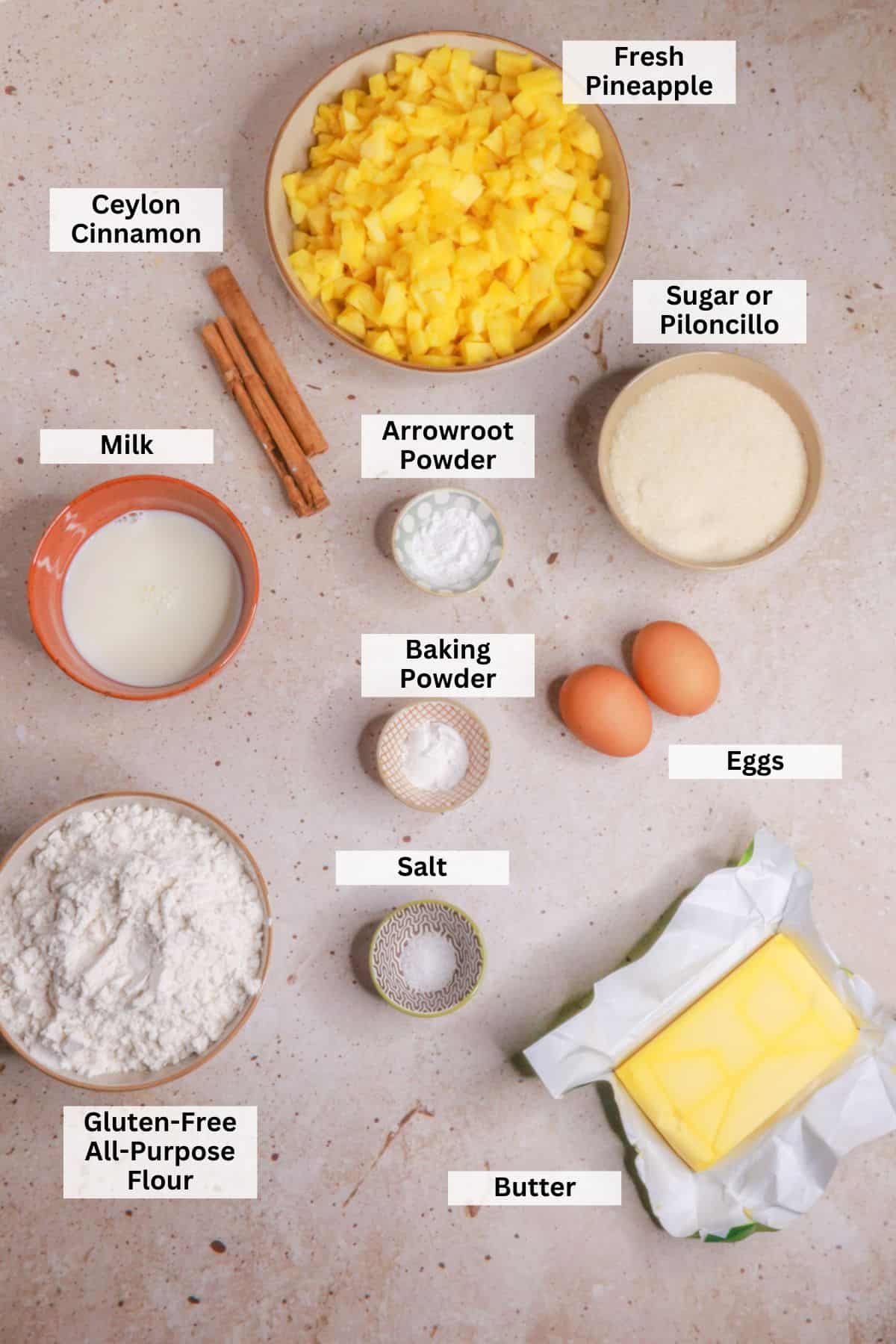 Ingredients for pineapple empanadas: fresh pineapple, Ceylon cinnamon, sugar, milk, arrowroot starch, eggs, baking powder, salt, gluten-free all-purpose flour, butter