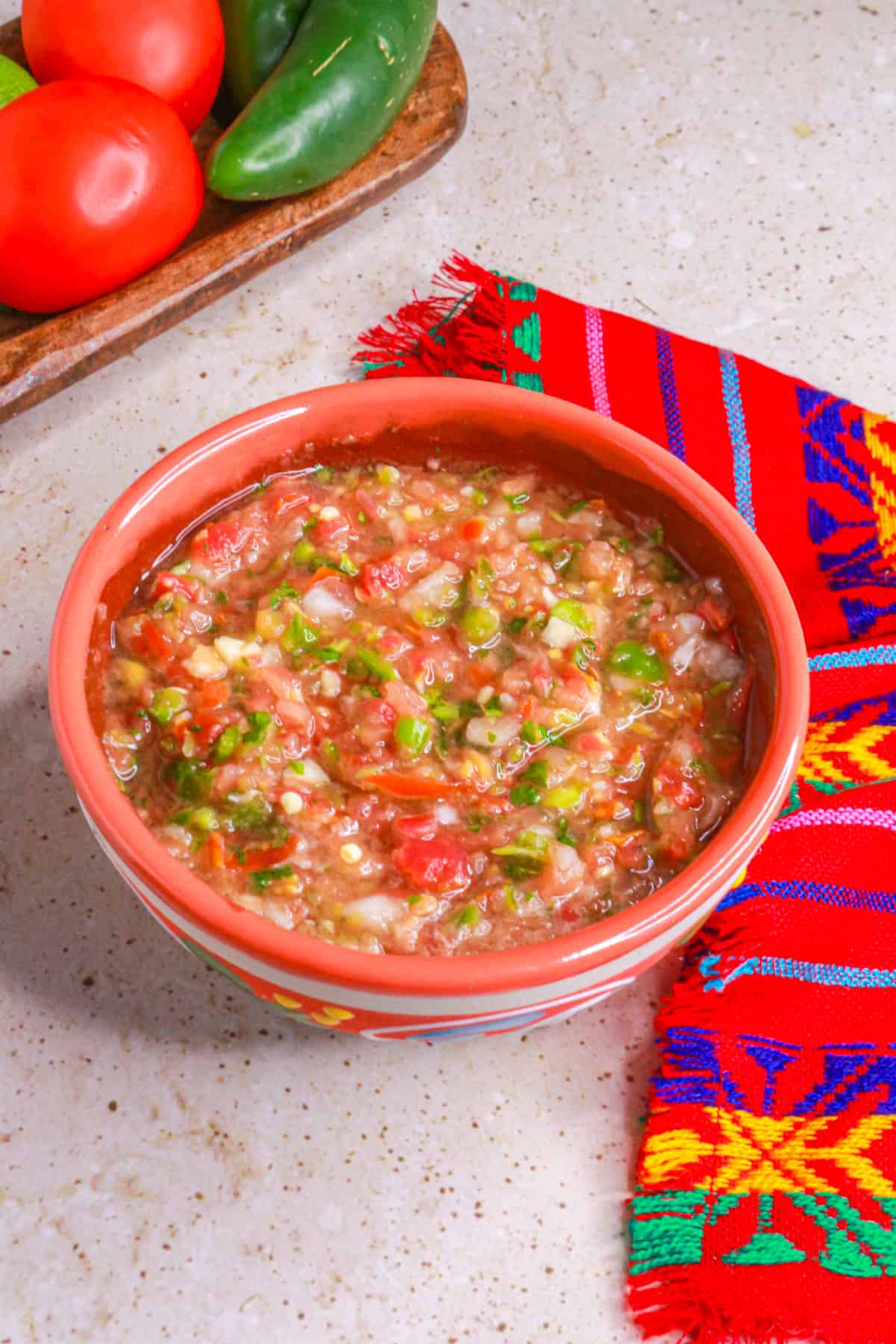 Side view of salsa cruda (raw tomato salsa)