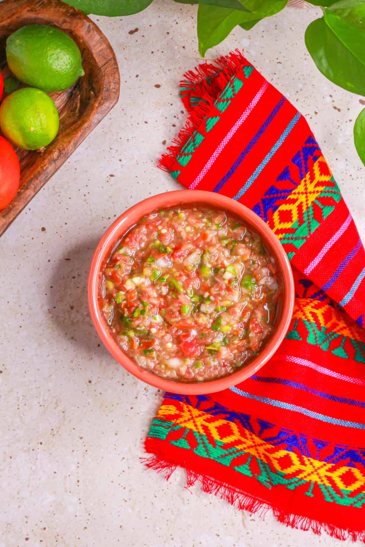 Top view of a bowl of salsa cruda (raw tomato salsa)