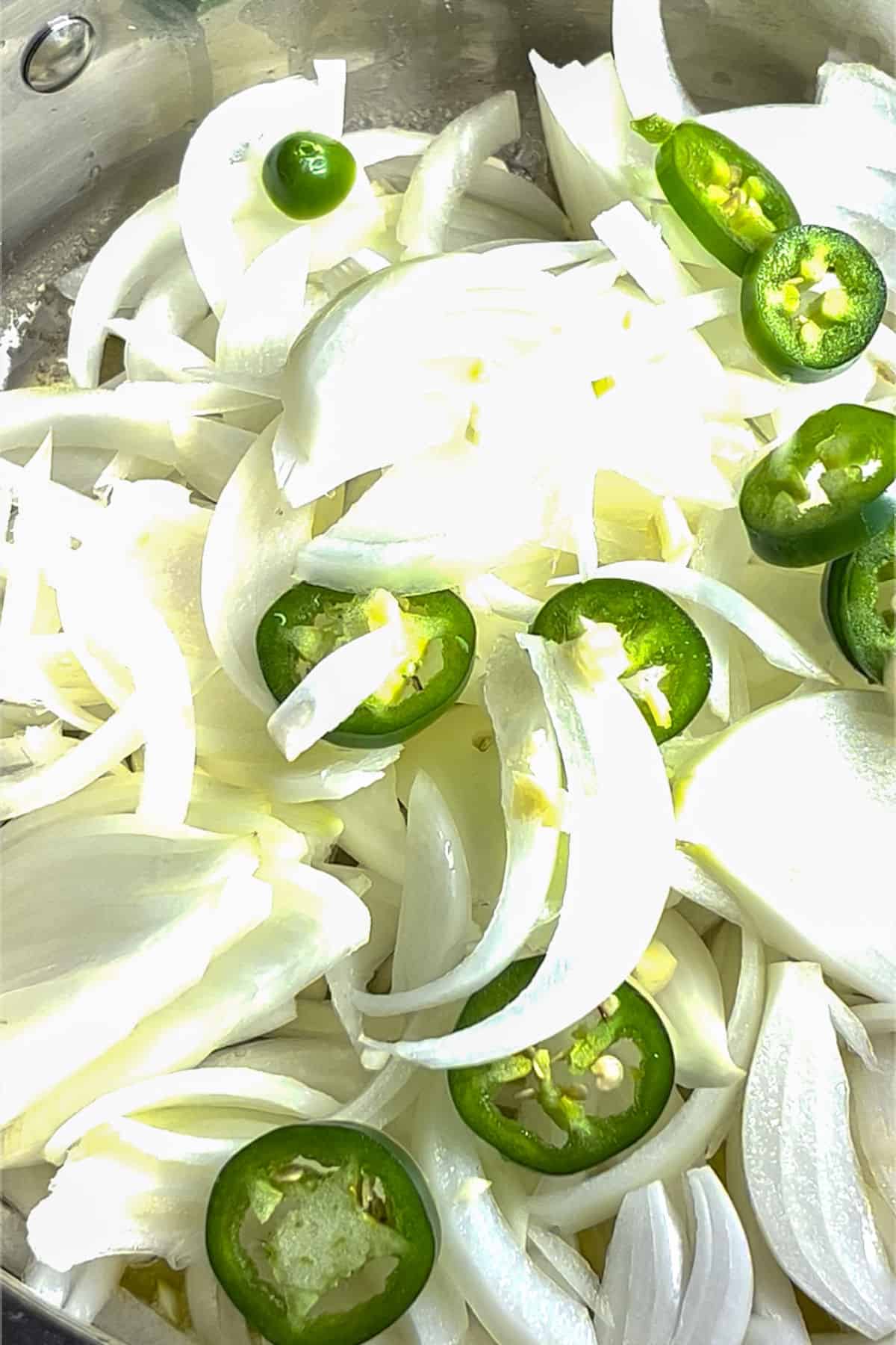 Sautéing aromatics in a pan