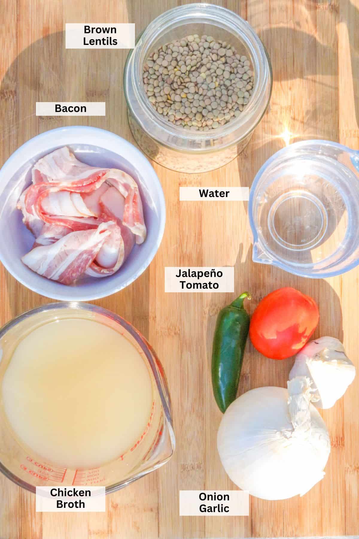 Ingredients for Mexican Lentil Soup: brown lentils, bacon, water, jalapeño, tomato, chicken broth, garlic, onion