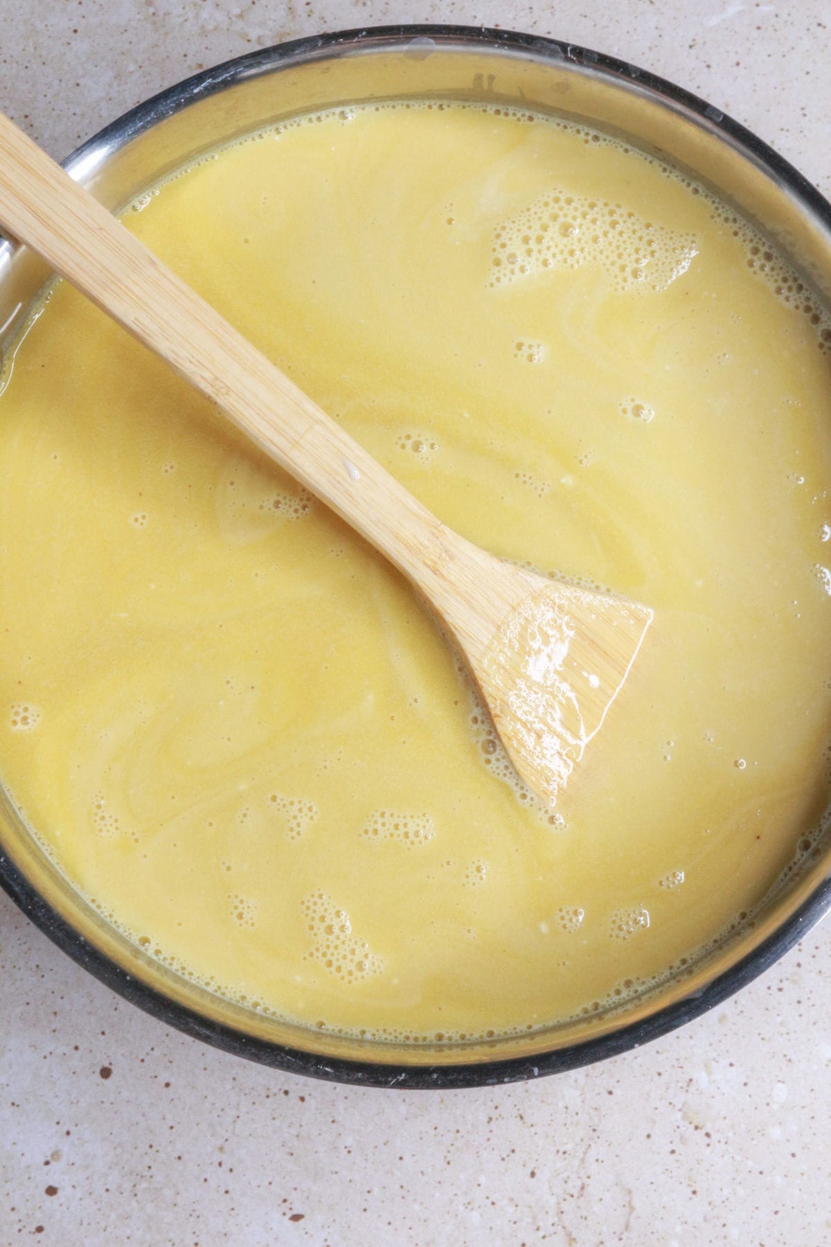 stir in milk into atole