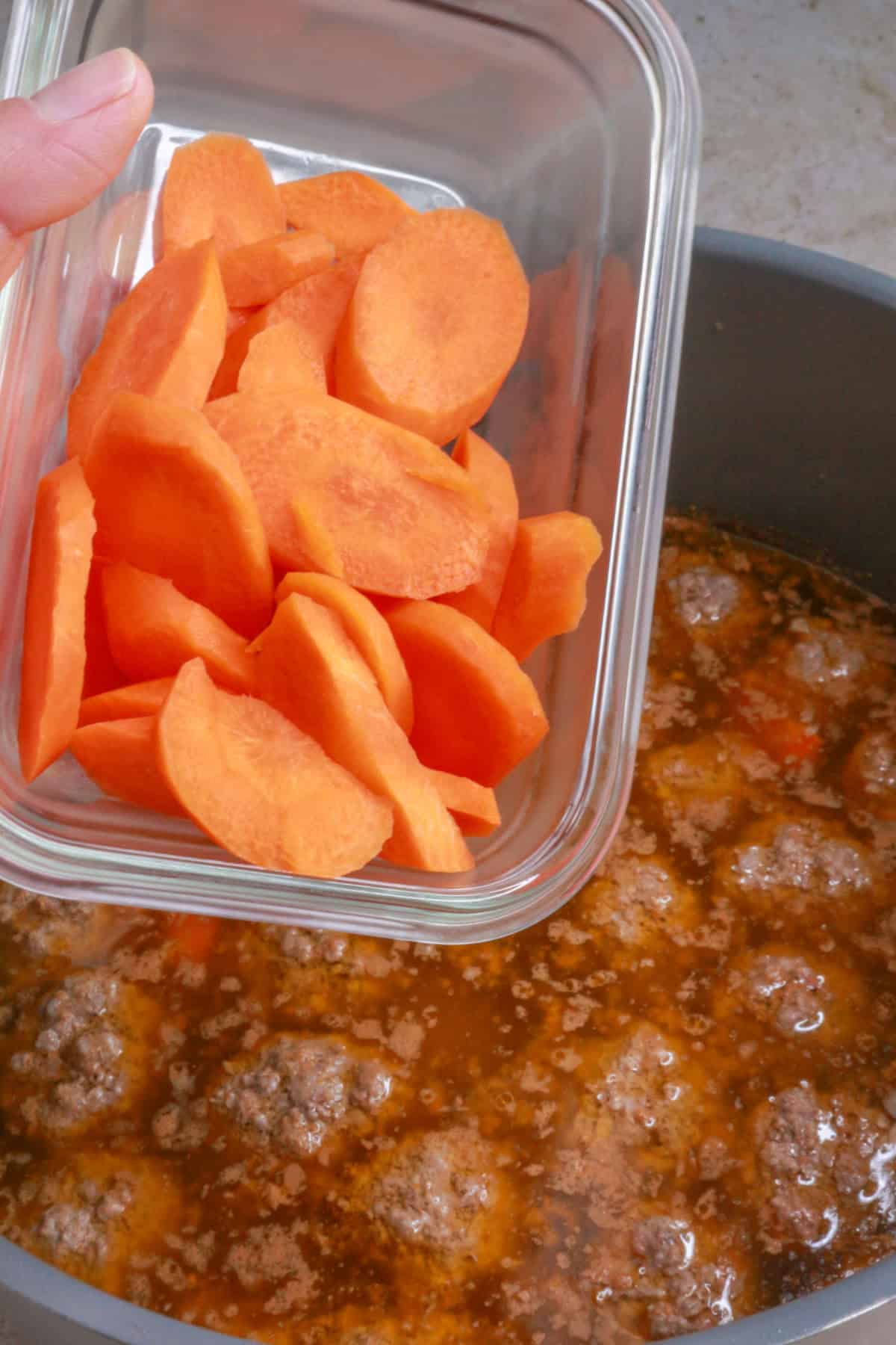 Adding carrots to broth