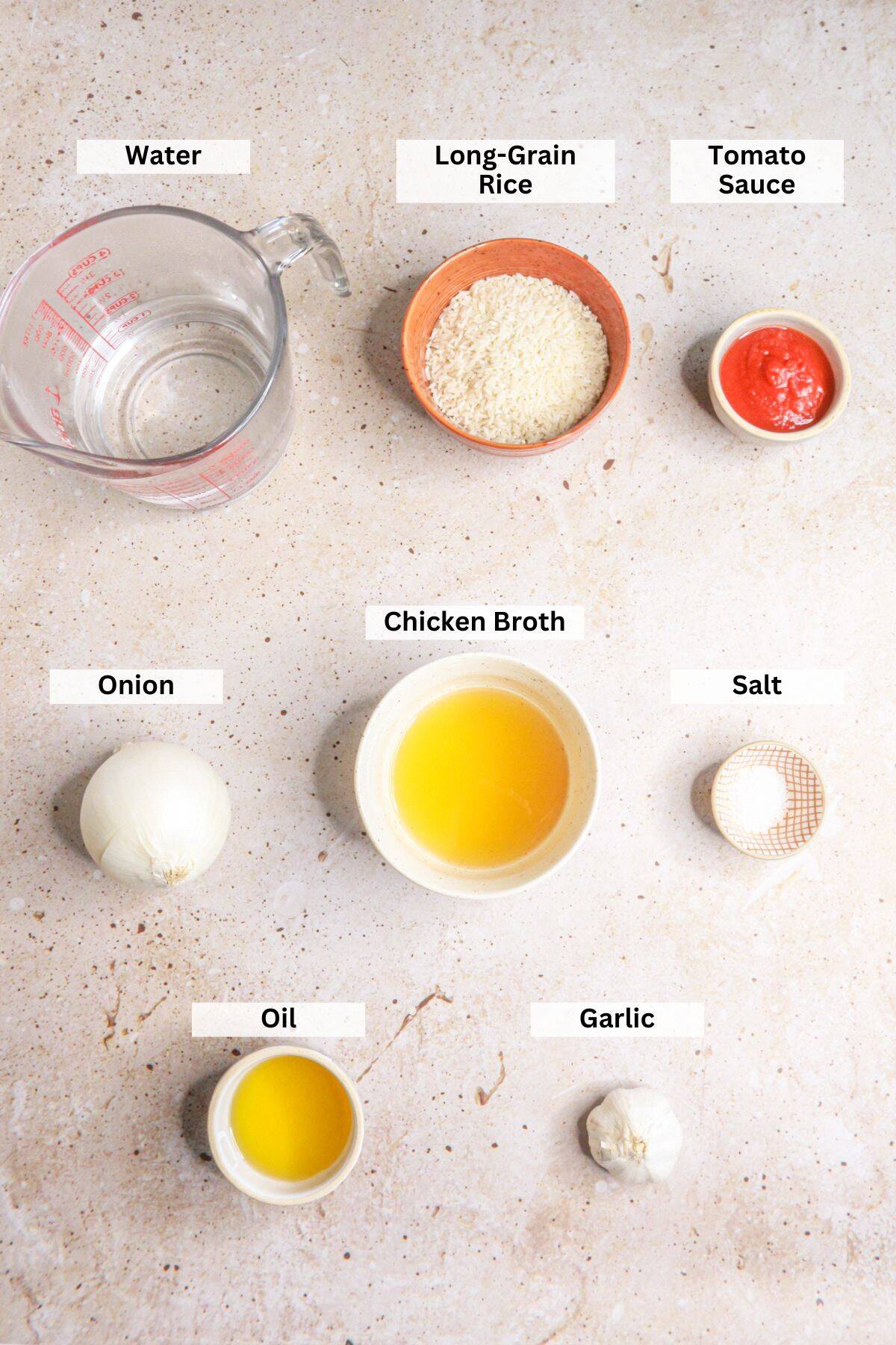 Ingredients for Arroz Rojo: water, rice, tomato sauce, onion, chicken broth, salt, oil, garlic