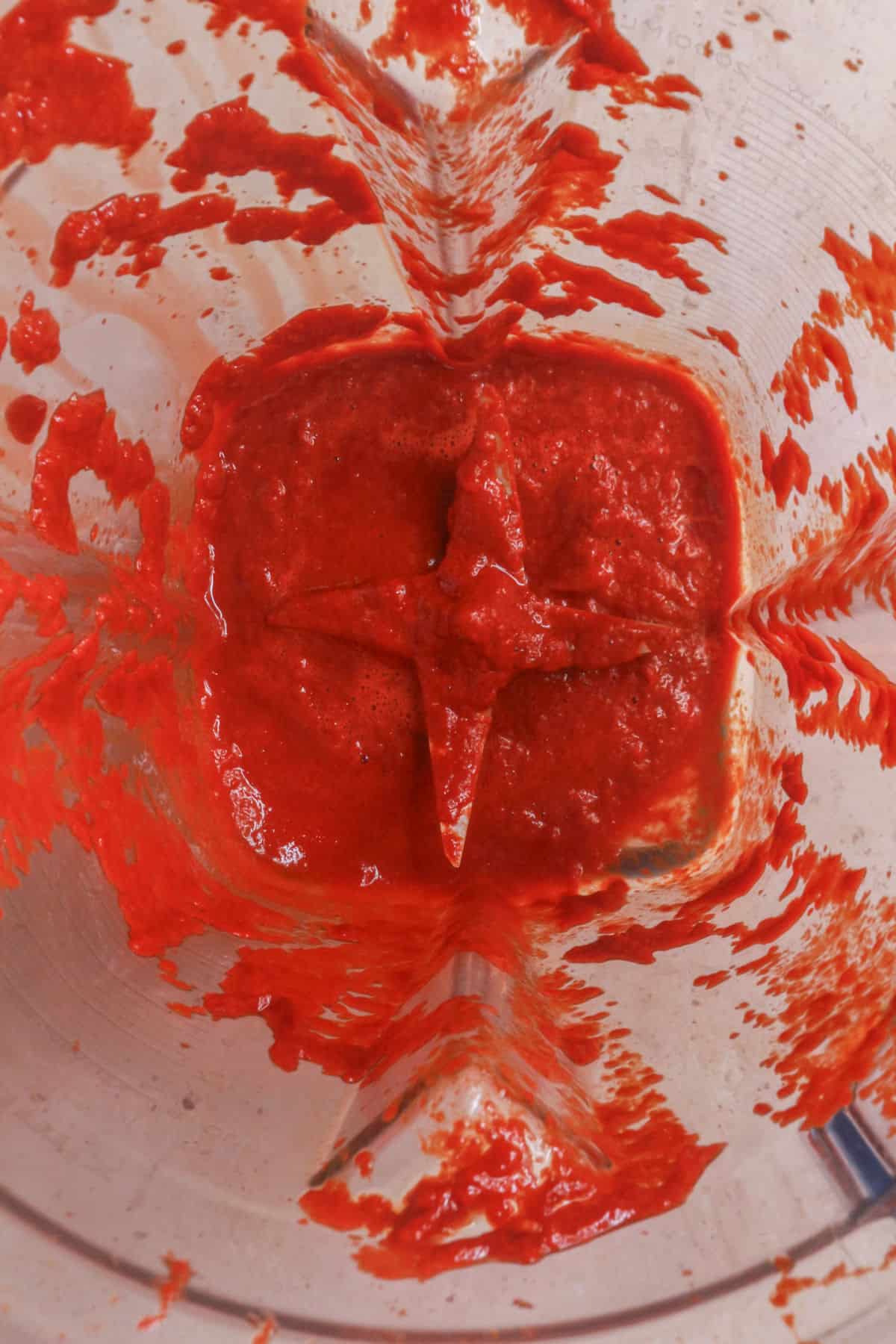 Blend rehydrated chiles with spices and onion to make red enchilada sauce