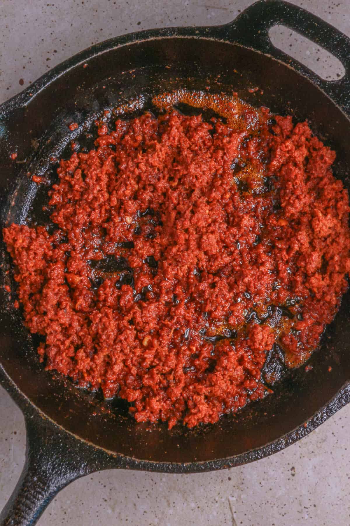 Cooking chorizo in a cast-iron skillet