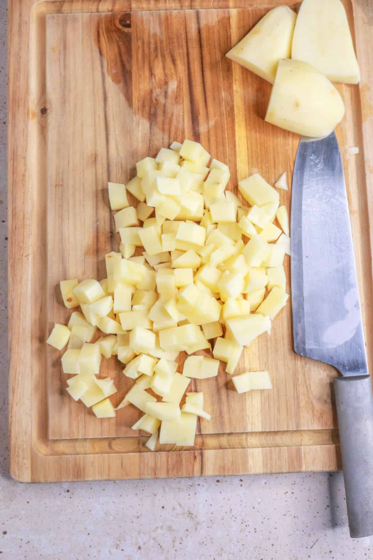 Diced potatoes on cutting board