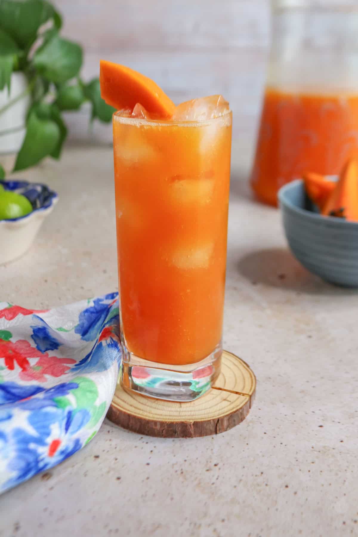 Close up of glass filled with agua de papaya