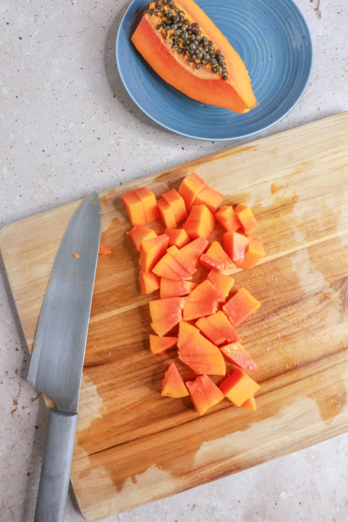 Cut papaya on a cutting board