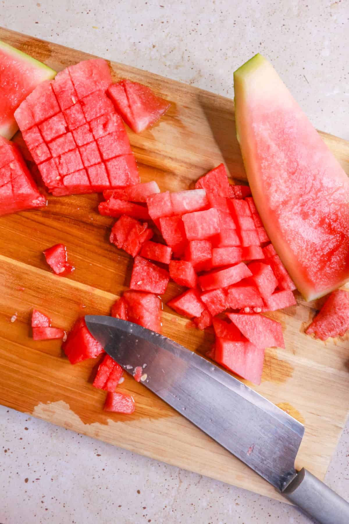 Chopped watermelon on cutting board