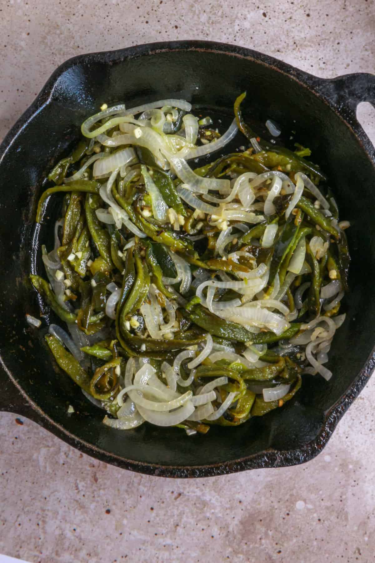 onions, peppers and onions in a skillet