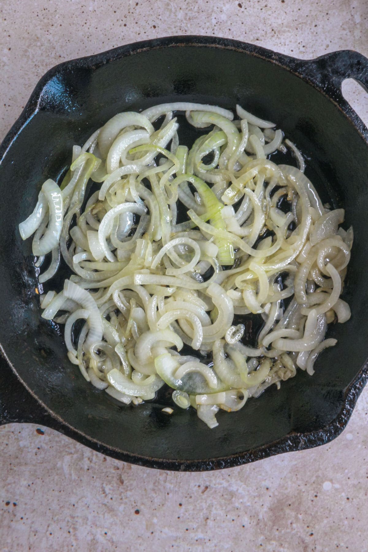 cooking sliced onions