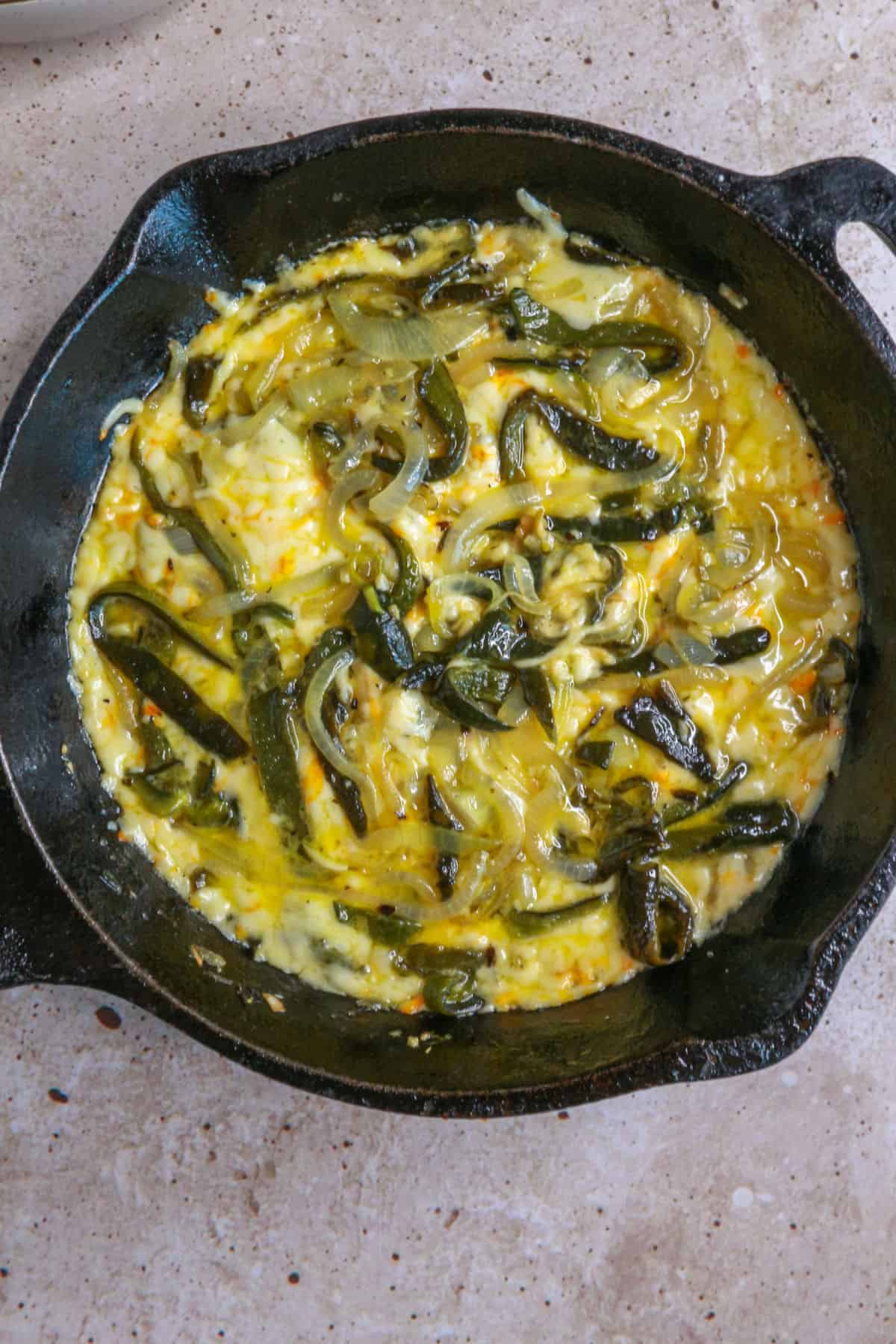completed queso fundido with the cheese melted