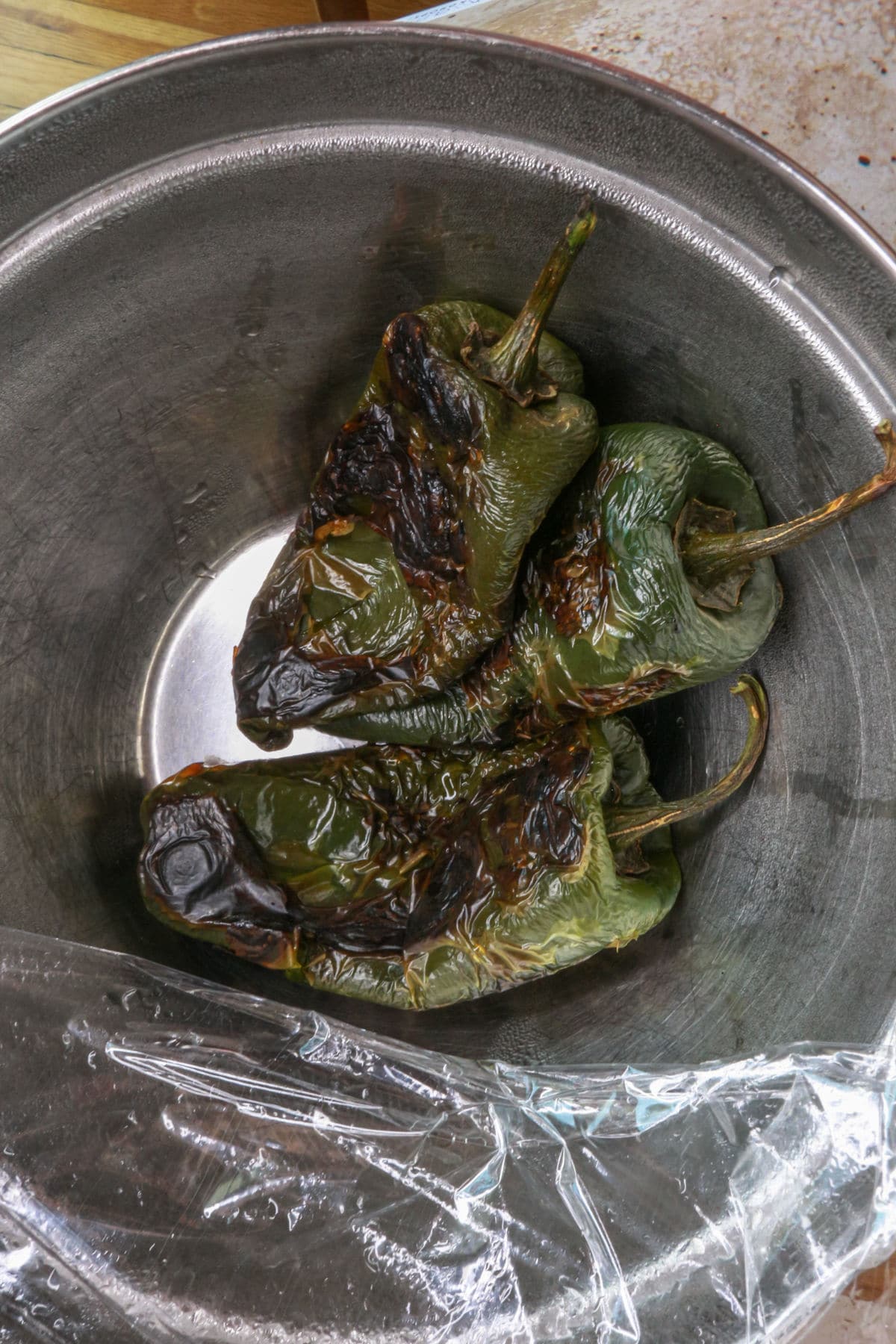 steaming the roasted poblano peppers