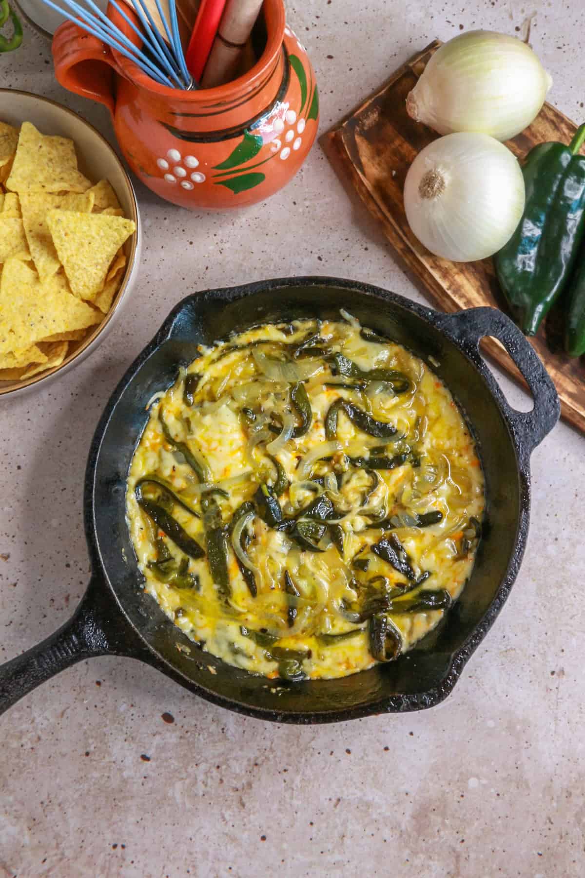 bird's eye view of a skillet of Roasted Poblano Queso Fundido