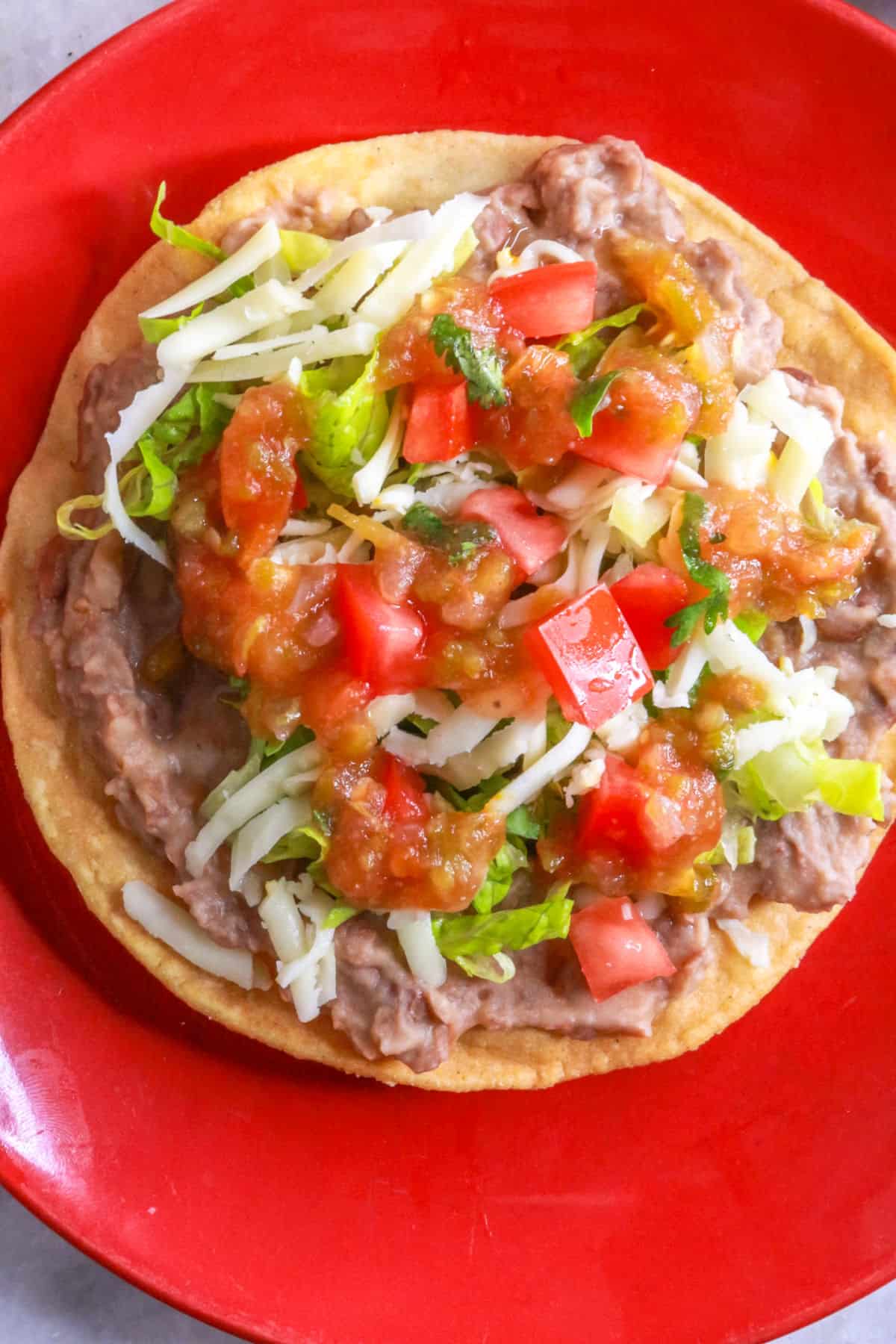 Bean tostada with all the toppings